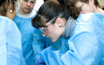 Medical students in an operation